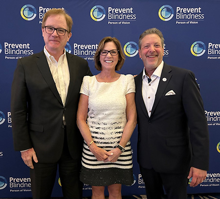 Jim Maureen Howard- Prevent Blindness Board of Directors Chair Jim McGrann, Advancing Eyecare, Prevent Blindness Person of Vision Committee Chair Maureen Cavanaugh, Advancing Eyecare, and 2025 Prevent Blindness Person of Vision Honoree, Dr. Howard Purcell, New England College of Medicine, attend the Prevent Blindness Person of Vision gala at Vision Expo East.