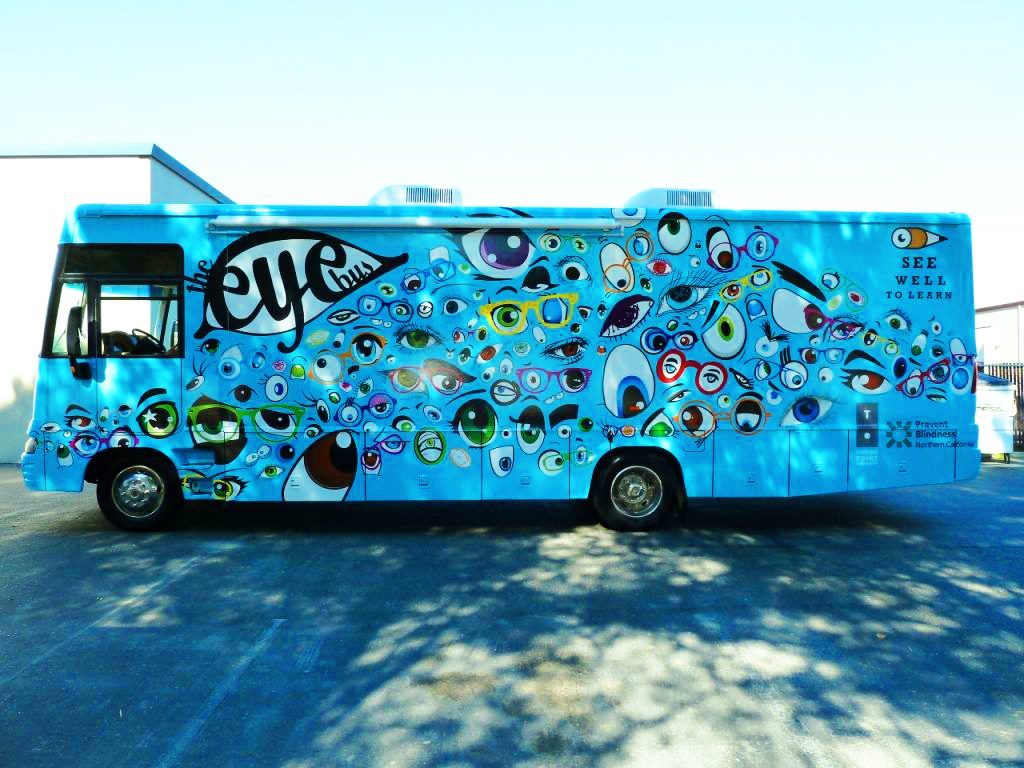 Photo of the see well to learn eye buss covered in different animated eye drawings
