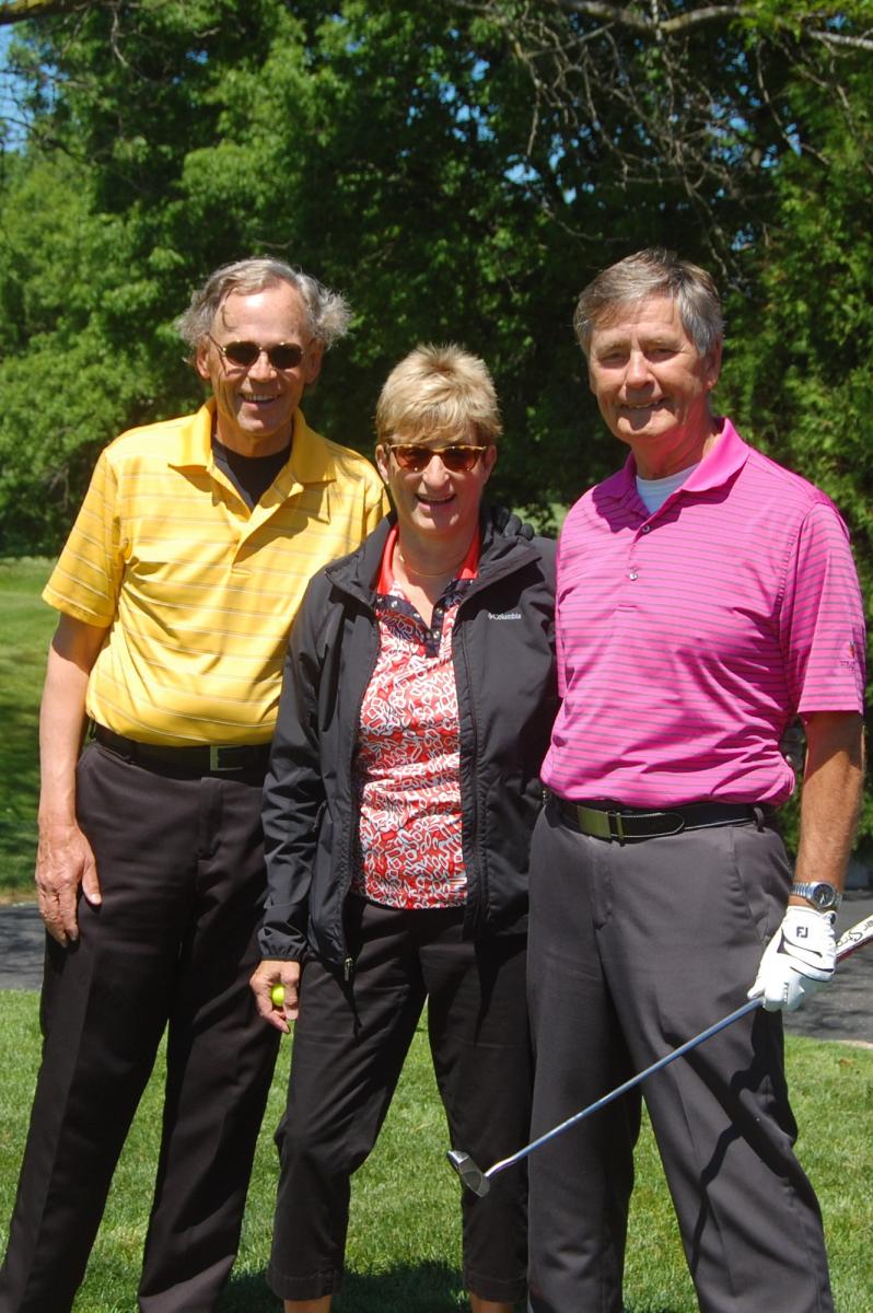 Three PreventBlindness members posing on the golf course