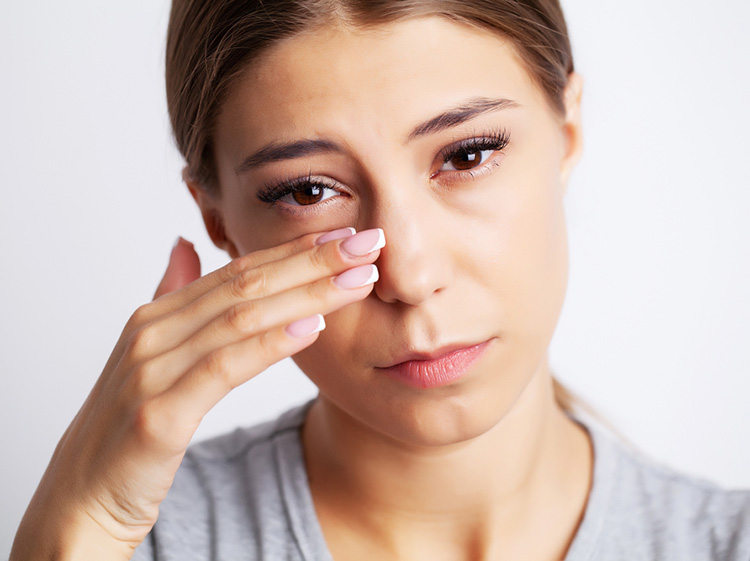 a woman with eye inflammation