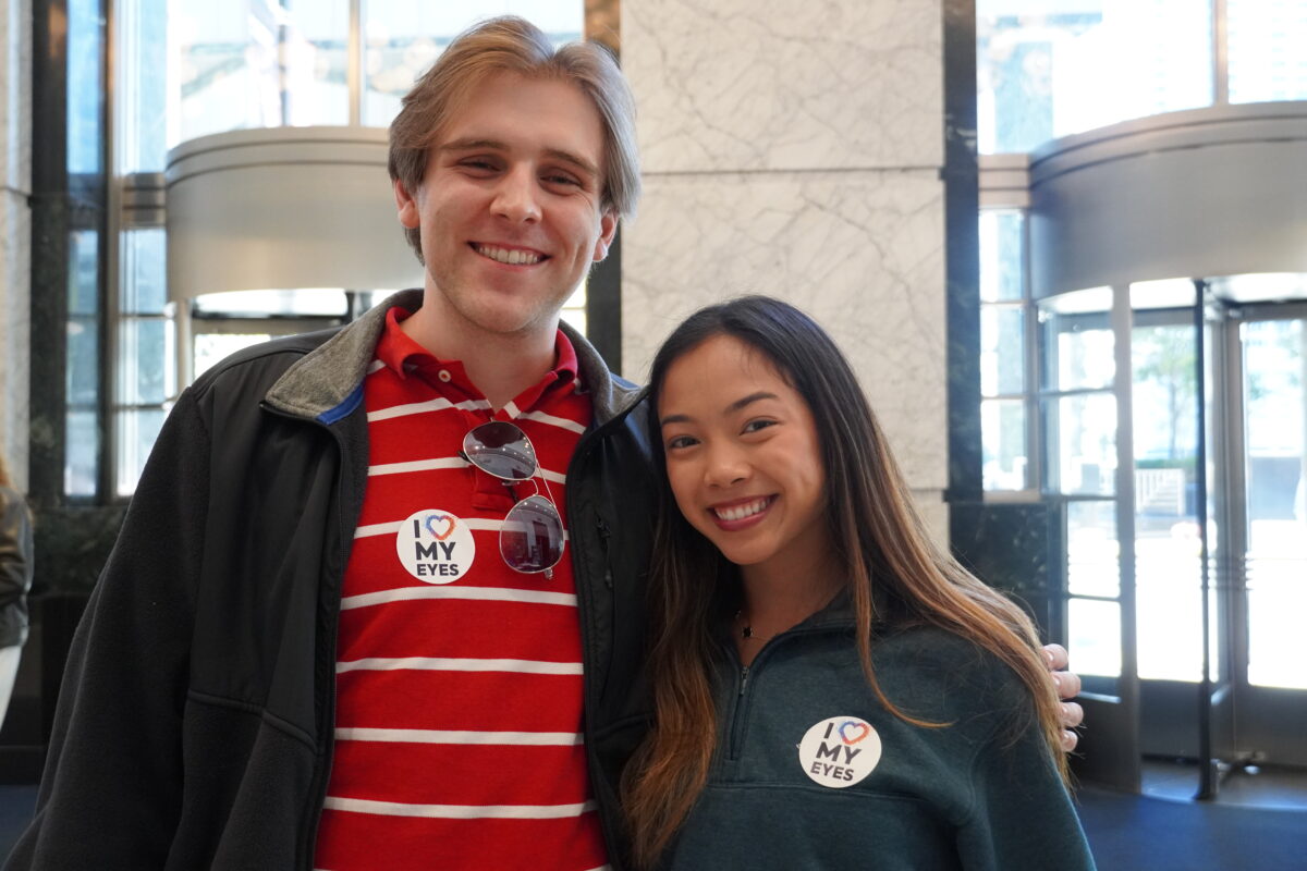 Vision screening participants show off their 'I Love My Eyes stickers.'