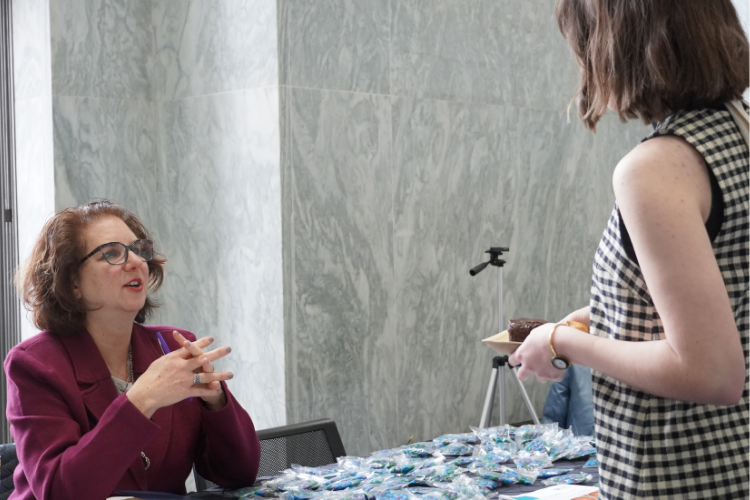 Donna Fishman, Director of the National Center for Children's Vision and Eye Health, talks to a participant. Donna Fishman, Director of the National Center for Children's Vision and Eye Health, talks to a participant.